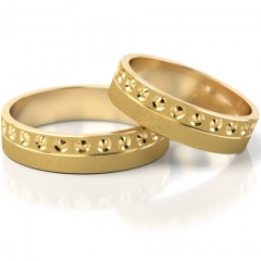 Płaskie zdobione złote obrączki ślubne próby 585